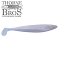 Action Plastics 12" Dredge Shad fishing lure in translucent pearl color with a paddle tail, designed for musky and other freshwater fishing applications.