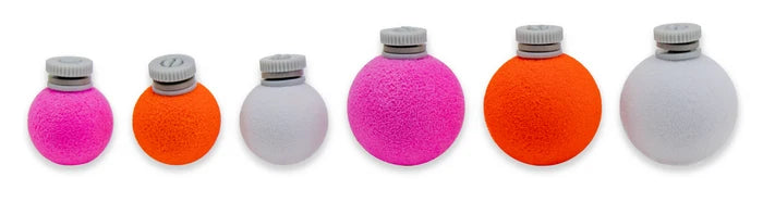 Six spherical air-lock fishing bait containers in bright pink, orange, and white colors, arranged in a row showing various sizes, labeled Air-Lock Classic (3 Pack).