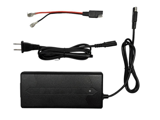 Amped Outdoors 6A NMC 16.8V Charger (NMC Batteries ONLY) shown with power cord and battery connector cables, black rectangular charger designed for efficient charging of compatible NMC batteries.