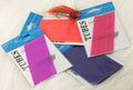A display of brightly colored Aqua Flies Poly Tubes in pink, purple, and orange packaging, used for fishing tackle and lure customization, arranged on a light surface.