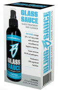 Bottle of Bling Sauce - Glass Sauce Glass treatment and Cleaner alongside its packaging highlighting a large terry cloth towel included for hygienic glass cleaning and pathogen removal.