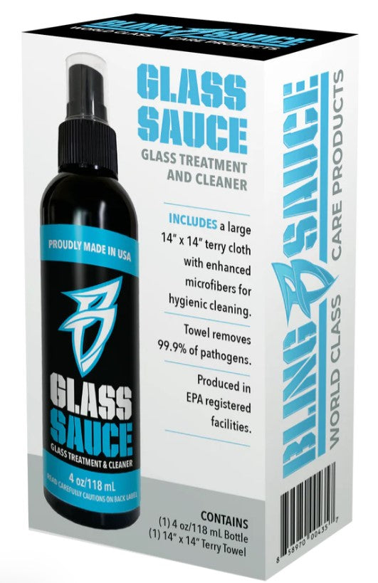Bottle of Bling Sauce - Glass Sauce Glass treatment and Cleaner alongside its packaging highlighting a large terry cloth towel included for hygienic glass cleaning and pathogen removal.