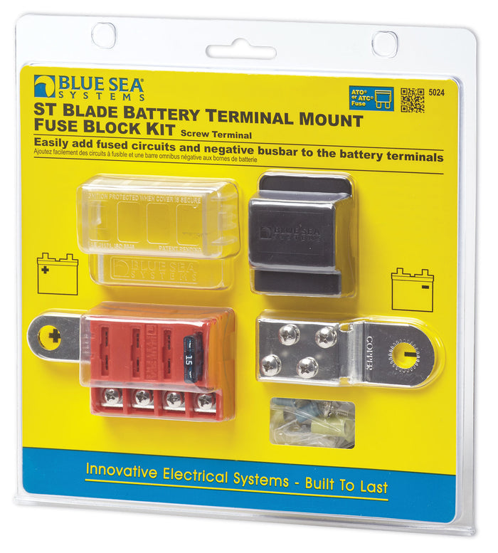 Blue Sea Systems ST Blade Battery Terminal Mount Fuse Block Kit 5024 displayed in clear packaging with yellow backing, showing fuse block, mounting hardware, and protective cover.
