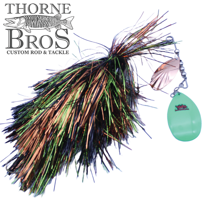 Close-up of the Blue Water Baits Gong Show 10 Magnum fishing lure featuring vibrant green, black, and copper tinsel skirt with attached spinner blade, designed for musky fishing.