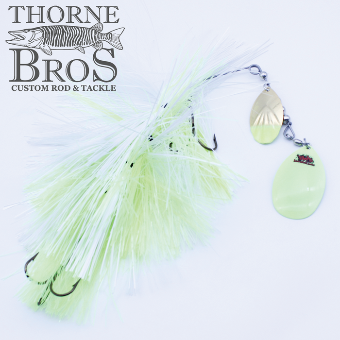 Blue Water Baits Gong Show 10 Magnum fishing lure in light yellow and white with metallic spinner blades and multiple hooks, designed for musky fishing.