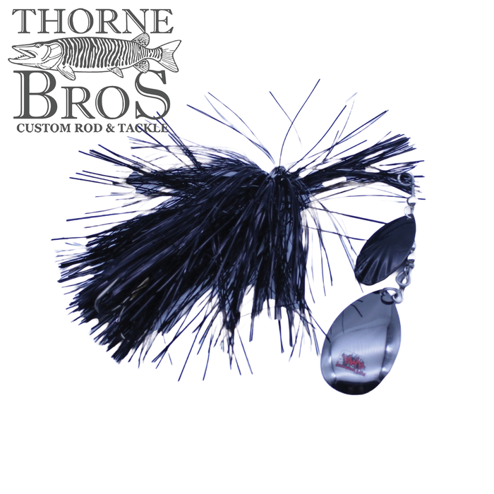Blue Water Baits Gong Show 10 fishing lure with black skirt and silver spinner blades, designed for musky fishing, displayed with Thorne Bros custom rod and tackle logo.