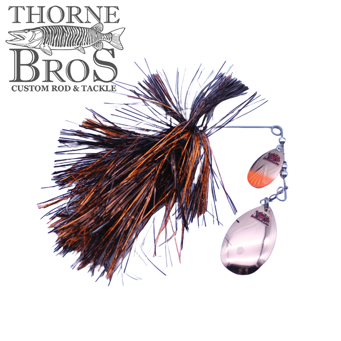 Blue Water Baits Gong Show 10 fishing lure with black and orange skirt and two reflective spinner blades, designed for musky fishing, shown on a white background.