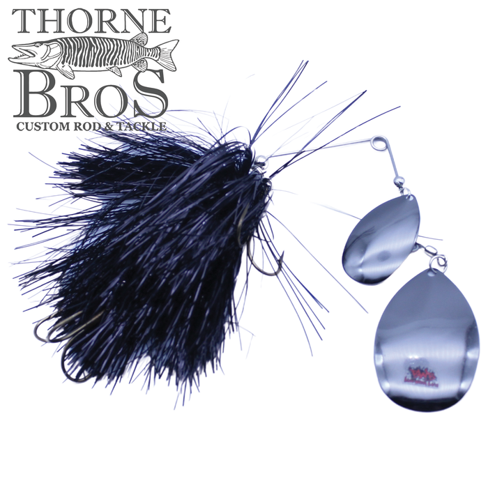 Blue Water Baits Gong Show 12 fishing lure with black feather skirt and two shiny silver spinner blades designed for musky fishing.
