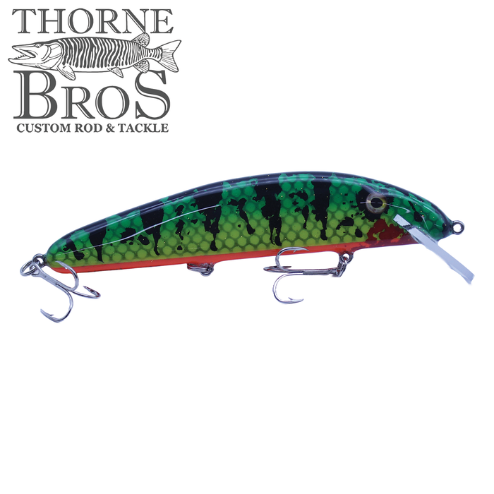 B&N Little Claw - 6.75" fishing lure featuring a green and black patterned body with red underside, two treble hooks, and a clear diving lip for musky fishing.