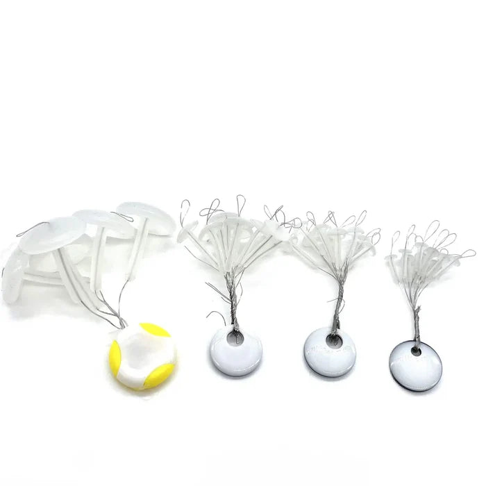 BnR Tackle T-Stops fishing tackle featuring multiple small white and yellow plastic stops attached to thin wire loops, used for securing lures on fishing lines.