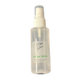 Clear plastic spray bottle with a white nozzle and label for Bob Mitchell's Super SlickFly Line Dressing, used for maintaining fishing tackle and fly lines.