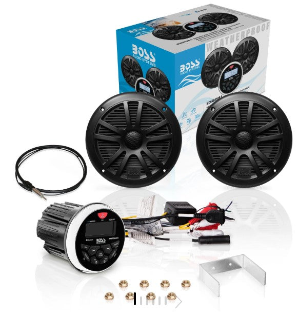 Boss Gauge radio kit w/Speakers and antenna MCKGB350B.6 featuring two black waterproof marine speakers, a digital radio unit with control buttons, wiring harness, mounting bracket, and installation hardware.
