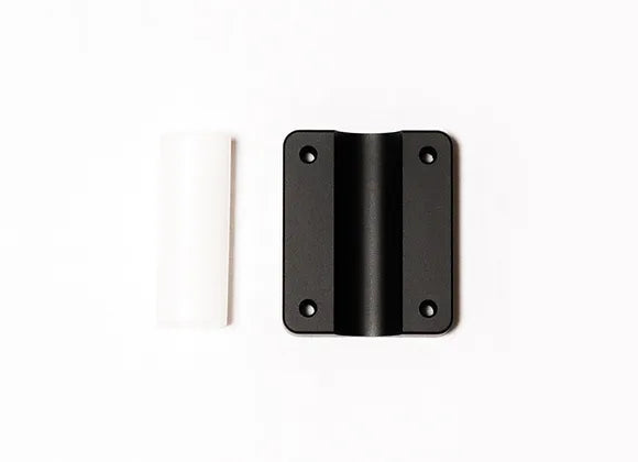 Brew City Rail Bottom w/ Plastic Sleeve 000-1002 showing a black metal mounting base with four screw holes and a white plastic sleeve designed for securing fishing rods and tackle.