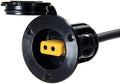 Cannon Flush Mount Power Port showing a black circular mounting base with a protective cap and a yellow dual-slot power connector for marine electronics and fishing tackle applications.