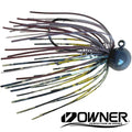 Close-up of a Cast Again Ringer Jig fishing lure featuring a weighted round head with multiple multicolored rubber strands designed for effective fishing tackle use.