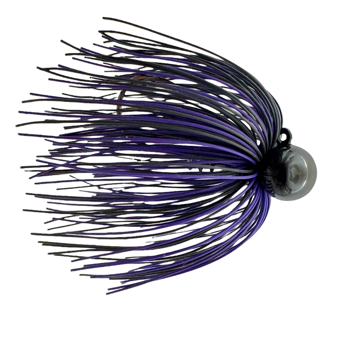 Cast Again Tapout Finesse Football Living Rubber Jig featuring a weighted football-shaped head and multi-strand purple and black rubber skirt designed for fishing tackle use.