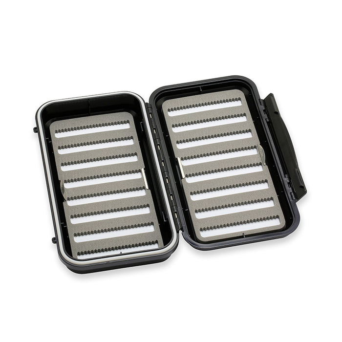 C&F Design Fly Boxes open to show black foam interior with multiple slotted ridges for securely holding fishing flies or lures, with a durable black plastic exterior.