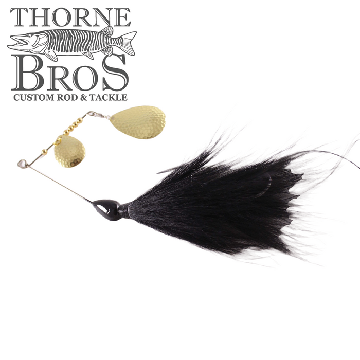 CJ'S Large Tandem fishing lure featuring a black feathered skirt and two gold hammered spinner blades, designed for attracting musky with realistic movement.