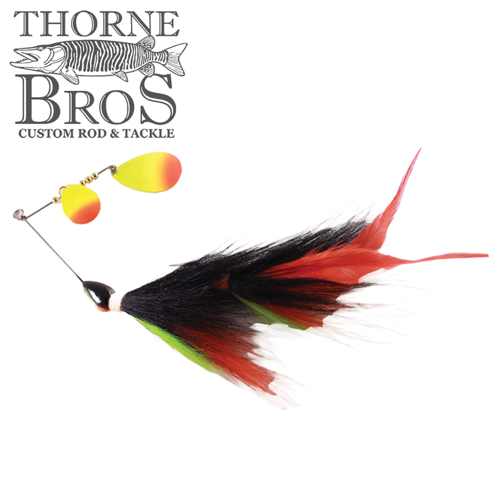 CJ'S Large Tandem fishing lure featuring vibrant red, black, and green feathers with two yellow and orange spinner blades, designed for attracting musky and large fish.