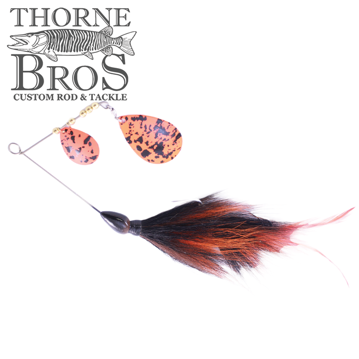 CJ'S Large Tandem fishing lure featuring two orange and black spotted spinner blades with black and orange feathered tail, designed for musky fishing tackle.