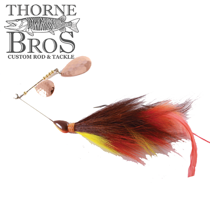 CJ'S Large Tandem fishing lure with red, yellow, and brown feather skirt and two hammered copper spinner blades, designed for musky fishing by Thorne Bros.