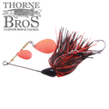 CJ'S Small Tandem Silicone fishing lure with black and red silicone skirt, two orange spinner blades, and a sharp hook designed for effective musky fishing tackle.
