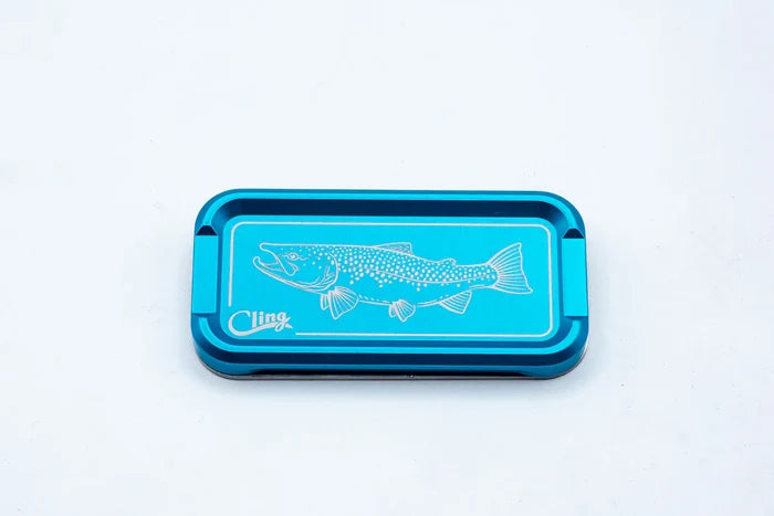 Cling Mag Grab Double Stack in metallic blue featuring an engraved trout design, a compact magnetic tackle box ideal for organizing fishing lures and small gear.