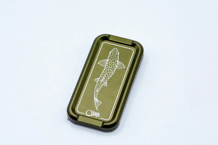 Cling Mag Grab Double Stack in olive green with white fish illustration, a compact magnetic tackle storage box ideal for organizing fishing lures and small tackle.