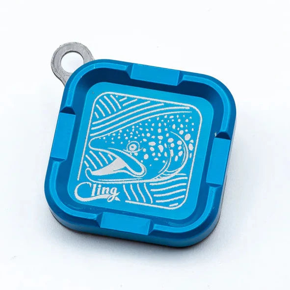 Cling Mag Grab Mini in blue with an engraved fish design, compact magnetic fishing accessory for holding fishing tackle securely.