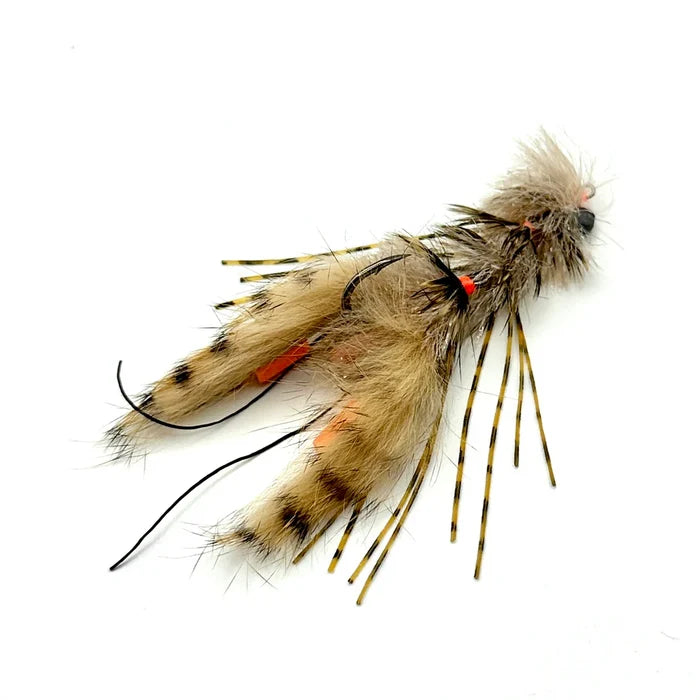 Craw Changer fishing lure with tan and black spotted fur, multiple hooks, and striped rubber legs designed to mimic a crawfish for musky fishing tackle.