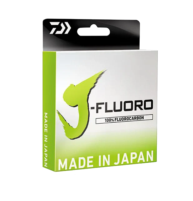 Daiwa J-Fluoro FC Mainline fishing line packaging with bold green and white design, highlighting 100% fluorocarbon material and made in Japan.