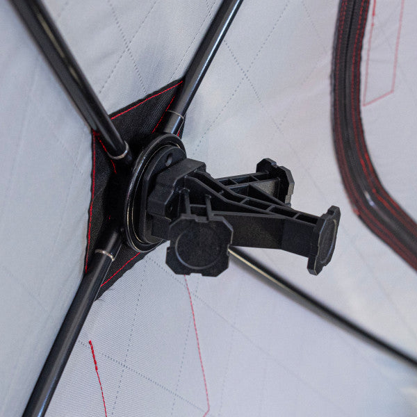 Close-up of the Eskimo E-Hub Triple Mount Splitter showing its black plastic triple rod holder attached to a gray fabric surface with black support rods, designed for fishing rod organization.