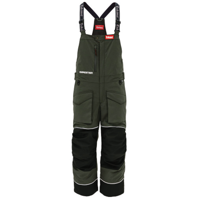 Eskimo Expedition Bib - Men's in dark green with black reinforced knee and ankle panels, adjustable black suspenders, multiple zippered and flap pockets, designed for outdoor fishing and ice fishing activities.