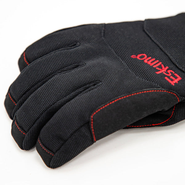 Close-up of a black Eskimo Hole Hopper Glove featuring durable textured fabric with reinforced stitching and red embroidered brand name on the back of the hand.