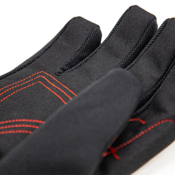 Close-up of a black Eskimo Hole Hopper Glove featuring red stitching and textured grip designed for durability and comfort during fishing activities.