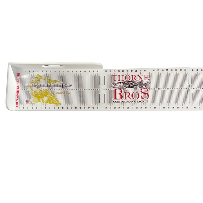 Fish Bumper Quad Fold Sturgeon Bump Board featuring a white measuring board with black and red markings, a fish graphic, and Thorne Bros branding for fishing tackle use.
