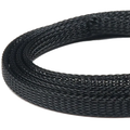 Flymen Fish-Skull Body Tubing in black, shown coiled, featuring a flexible braided mesh design for durable, versatile use in fishing tackle applications.