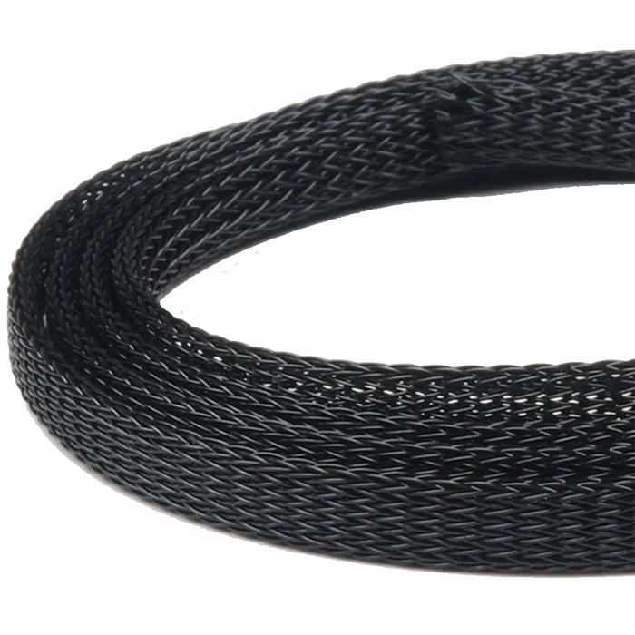 Flymen Fish-Skull Body Tubing in black, shown coiled, featuring a flexible braided mesh design for durable, versatile use in fishing tackle applications.