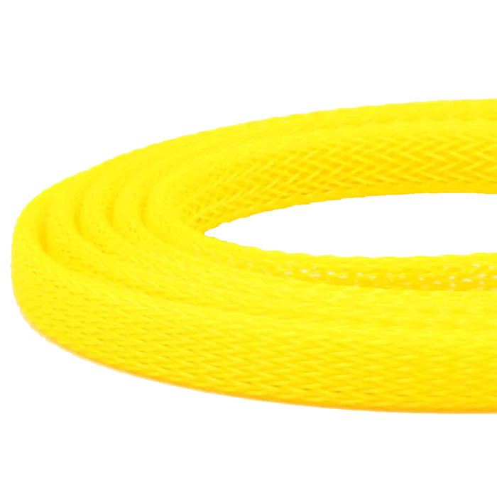 Bright yellow coiled Flymen Fish-Skull Body Tubing made of flexible, textured synthetic material ideal for customizing fishing tackle and fly fishing gear.