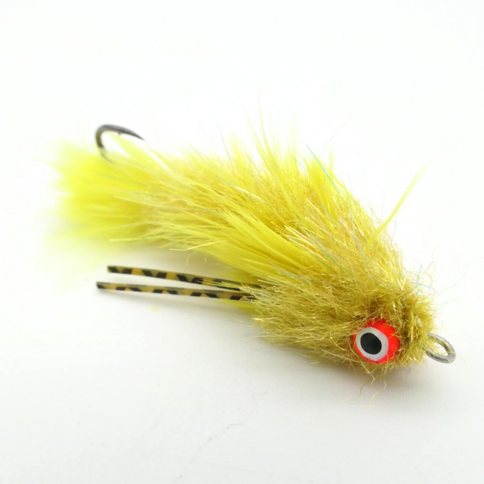 Flymen Next Woolly Bugger Changer fishing lure in yellow with lifelike eyes and detailed feathers, designed for fly fishing and fishing tackle enthusiasts.