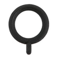 Close-up of a small black rubber ring with an attached tab, designed as a fishing tackle accessory, specifically the Frenzy Perfect Wacky O-Rings for securing fishing lures.