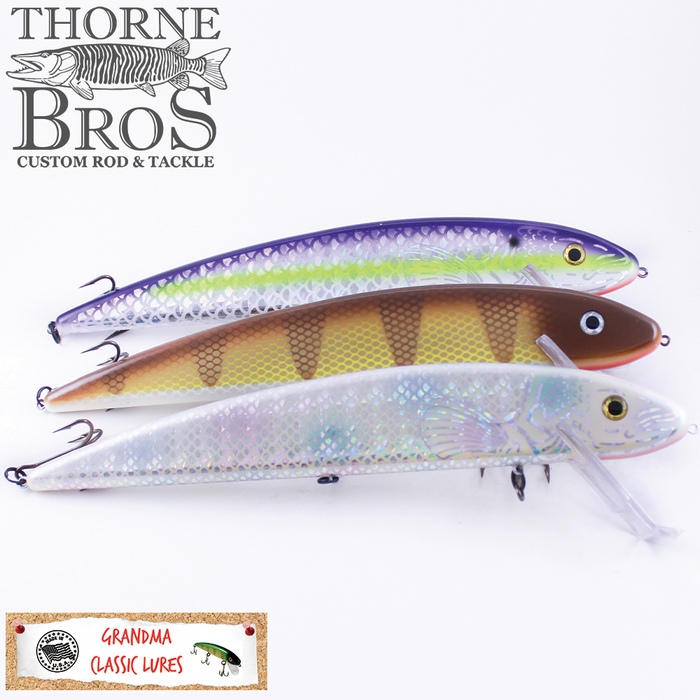 Grandma Lures 13" Crankbait showing three detailed fishing lures in vibrant colors including purple, brown, and iridescent white, designed for effective fishing tackle use.