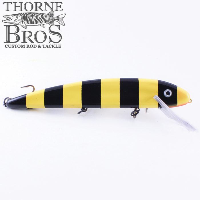 Grandma Lures 13" Crankbait fishing lure with a yellow and black striped body, three treble hooks, and a clear plastic diving lip for underwater movement.
