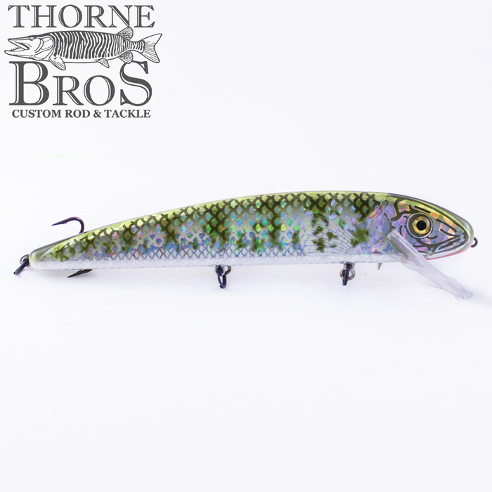Grandma Lures 13" Crankbait fishing lure with a detailed green and silver scale pattern, lifelike eye, and three treble hooks designed for freshwater fishing.