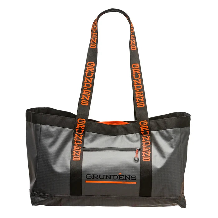 Gray and black Grundens Gear Hauler Tote Bag 50L with orange logo and lettering on sturdy long shoulder straps, designed for durable fishing tackle storage and transport.