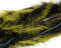 Hareline Barred Polychrome Rabbit Strips showing soft, barred fur in shades of green and black designed for fly fishing tackle and lure making.