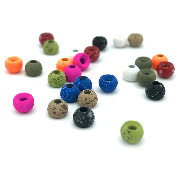 Hareline Mottled Tactical Tungsten Beads in various colors including orange, pink, blue, green, black, white, and tan, designed for fishing tackle and fly fishing applications.
