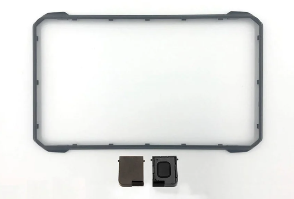 HDS-9 LIVE Bezel and SD-Card Door 000-14591-001 shown as a thin rectangular black bezel frame with two small black plastic components below, designed for marine electronics display protection and card access.