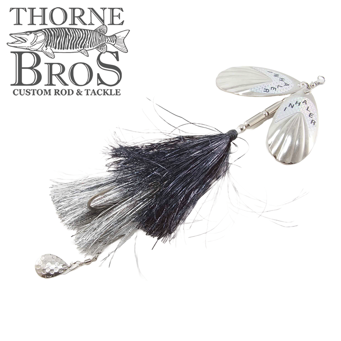 Inhaler Twinblade Firefly fishing lure featuring two silver spinning blades and a black and silver feathered skirt designed for musky fishing tackle enthusiasts.