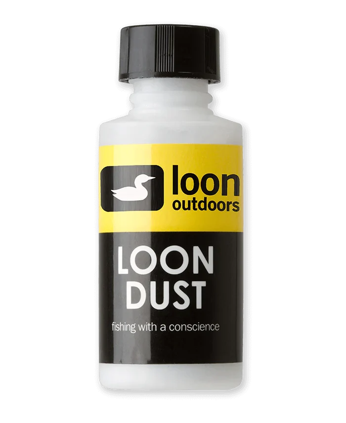 Small white plastic bottle with black cap labeled Loon Dust by Loon Outdoors, featuring yellow and black branding, used as fishing tackle accessory for scent application.
